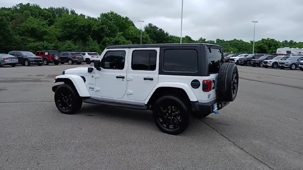 Used 2023 White Jeep Sahara 4xe image 6