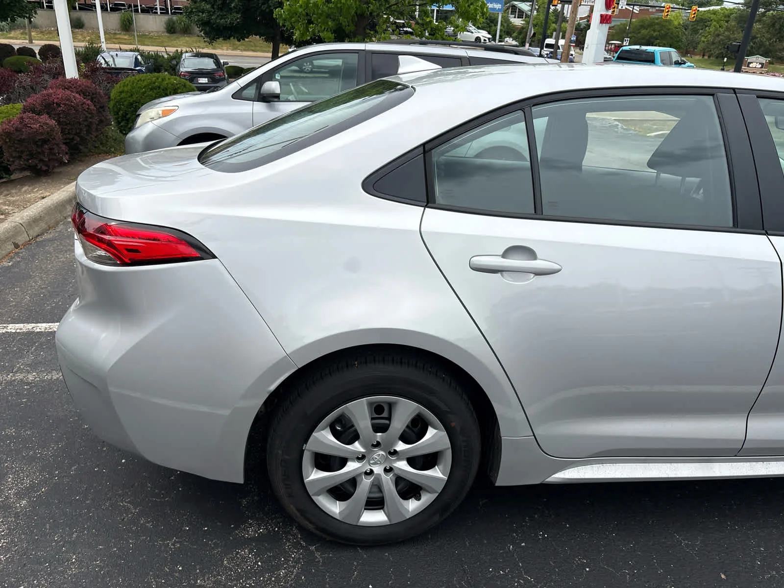 Used 2026 Classic Silver Metallic Toyota LE image 12