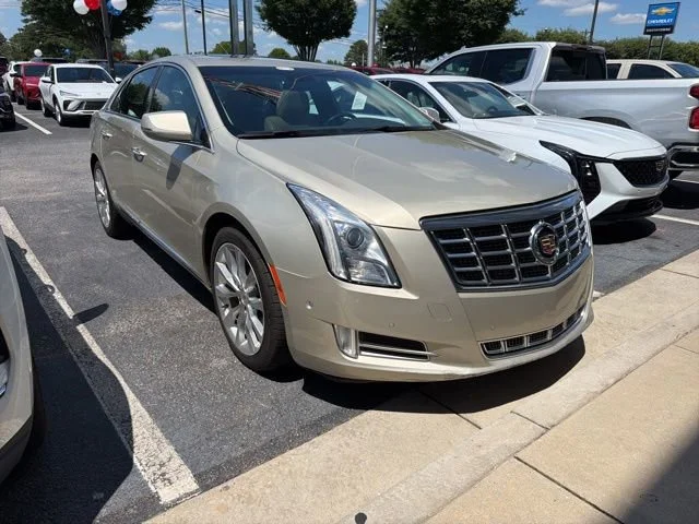 Used 2015 SILVER COAST METALLIC Cadillac Luxury image 1