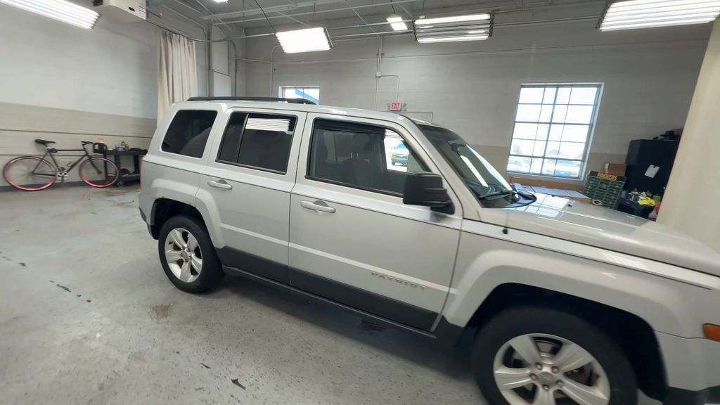 Used 2013 Jeep Patriot Latitude with VIN 1C4NJRFB4DD207411 for sale in Royal Oak, MI