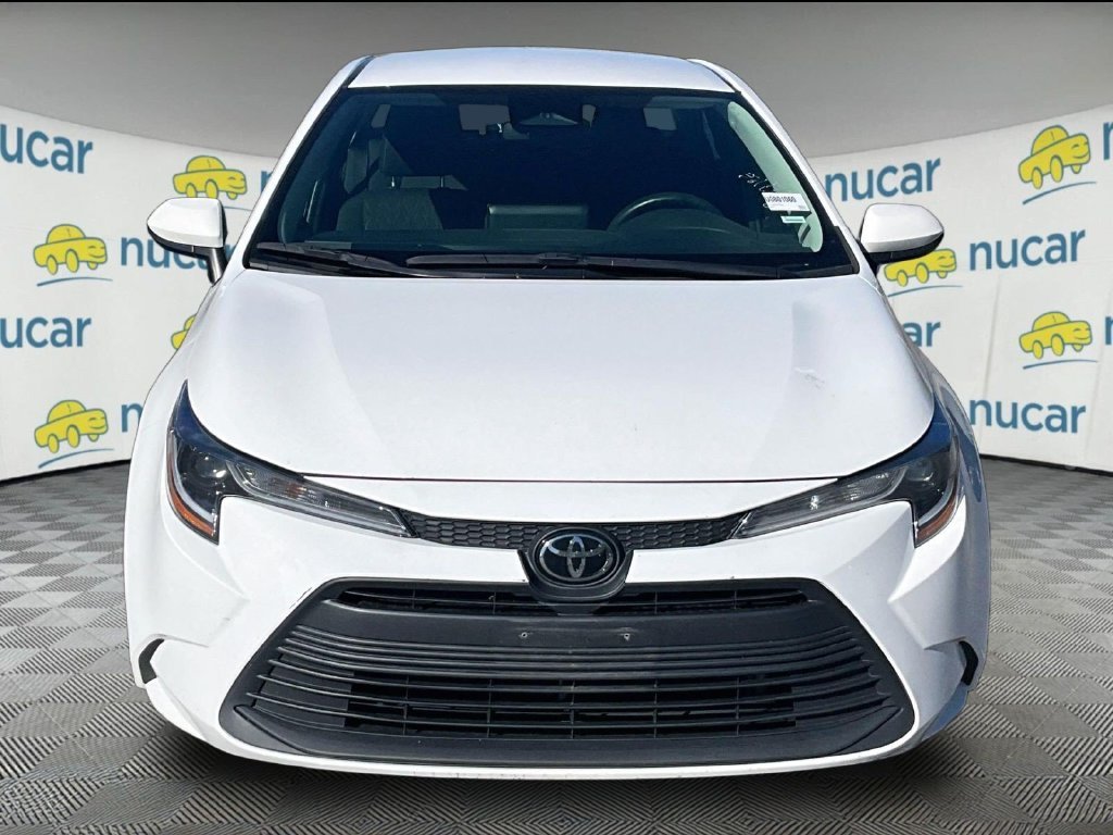 Used 2024 White Toyota LE image 2