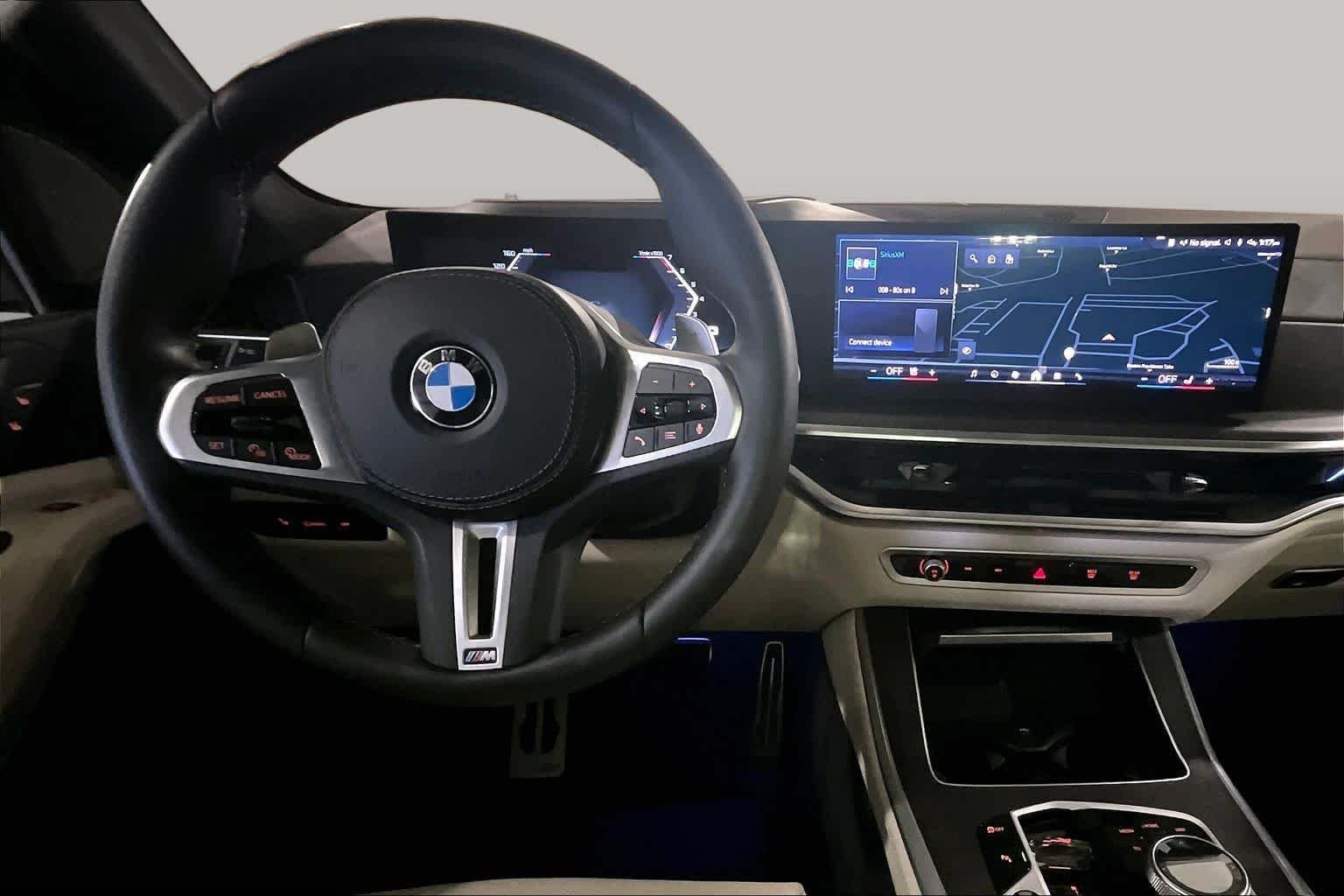 Certified Used 2024 Black Sapphire Metallic BMW M60i image 5