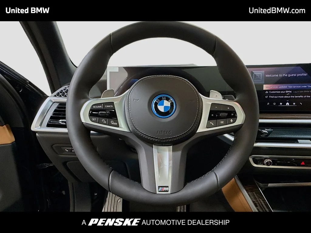 New 2026 Carbon Black Metallic BMW xDrive50e image 6