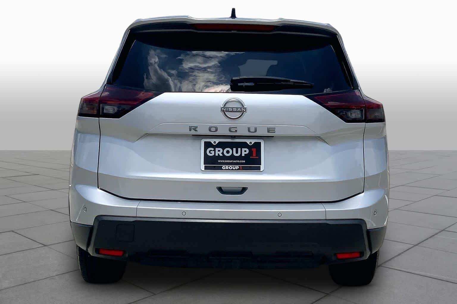 Used 2024 Brilliant Silver Metallic Nissan S image 5
