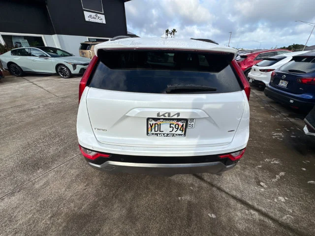 Certified Used 2025 White Kia EX Touring image 4