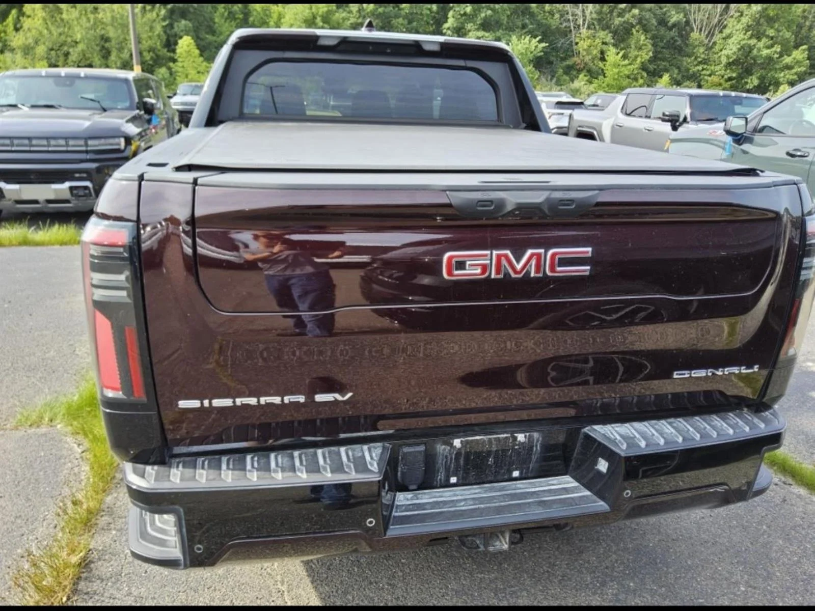 Used 2026 Dark Ember Metallic GMC Denali Max Range image 5