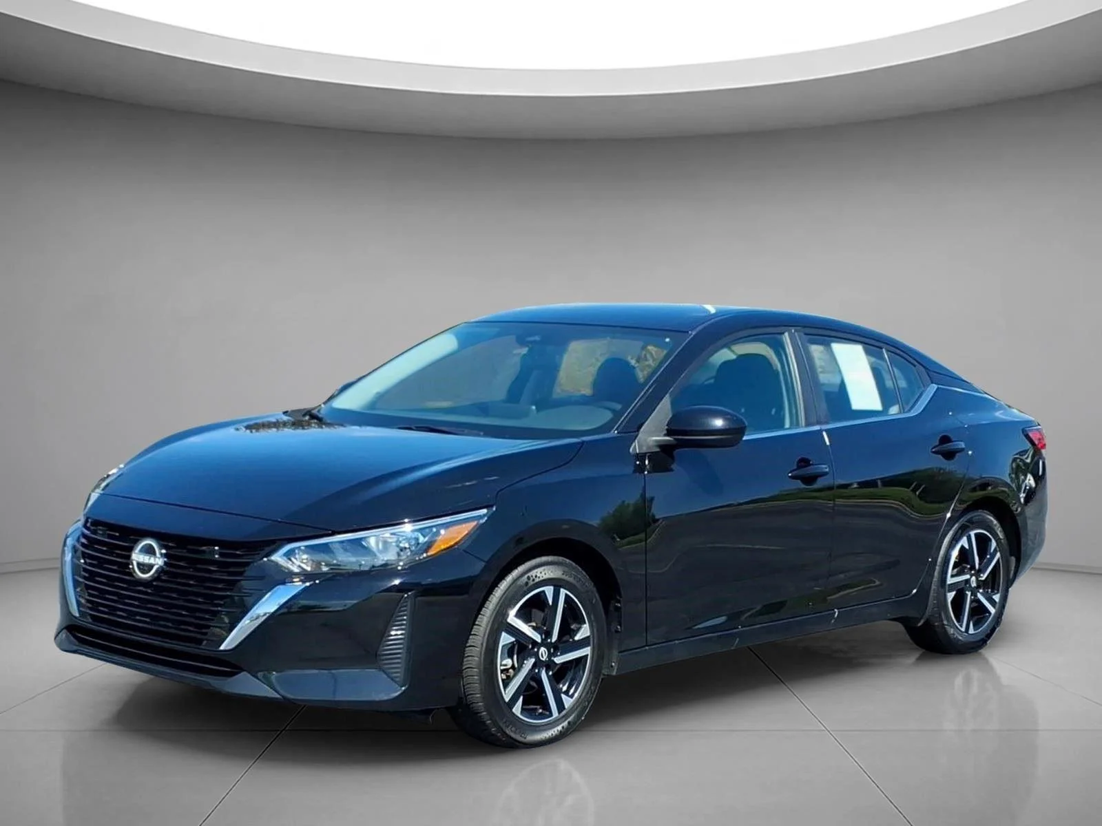 Used 2025 Super Black Nissan SV image 1