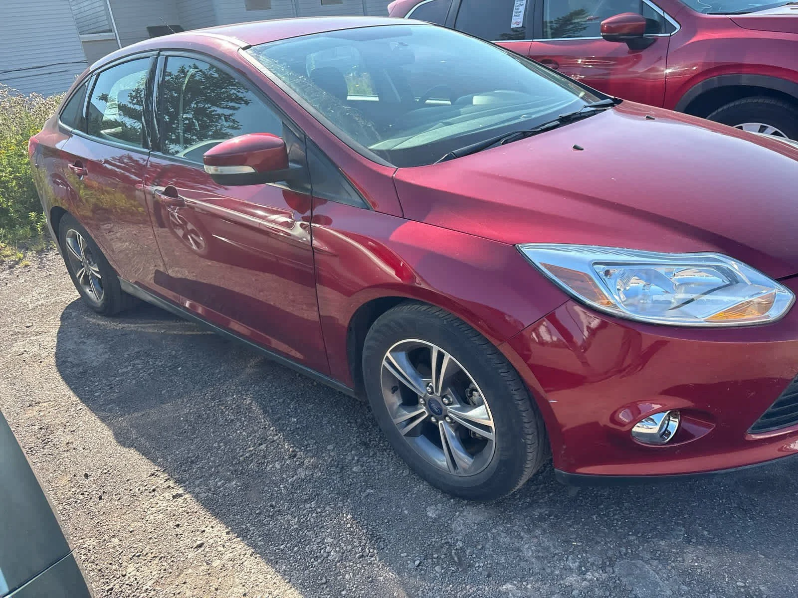 Used 2014 Ruby Red Tinted Clearcoat Ford SE image 9