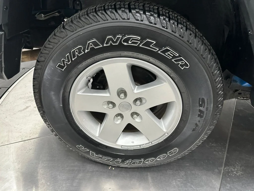 Used 2011 Blue Jeep Sport image 9
