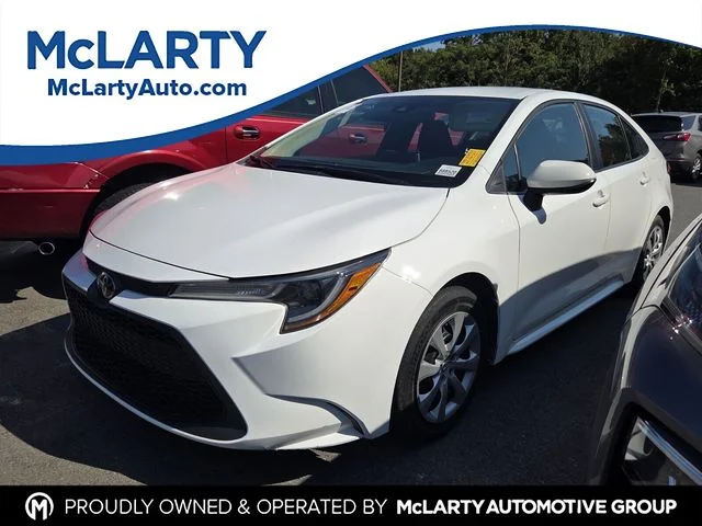 Used 2021 White Toyota LE image 1
