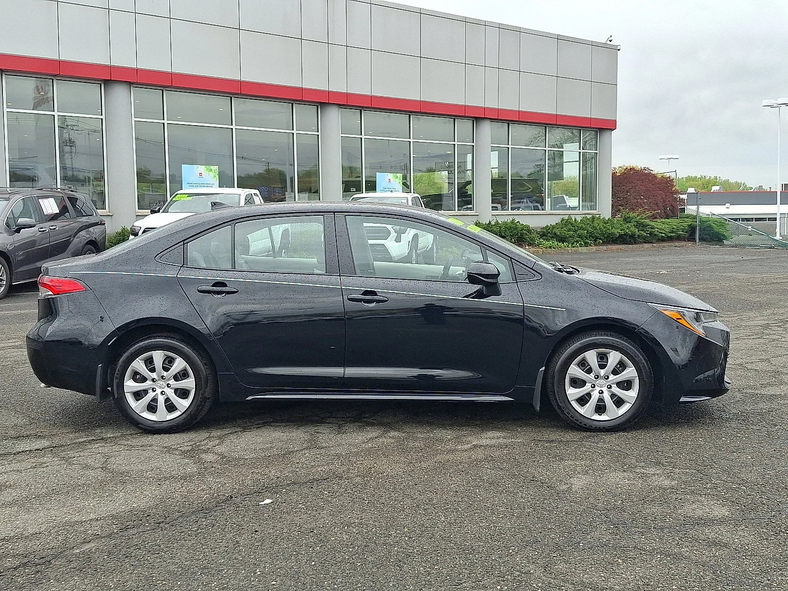 Used 2024 Midnight Black Metallic - 218 Toyota LE image 8