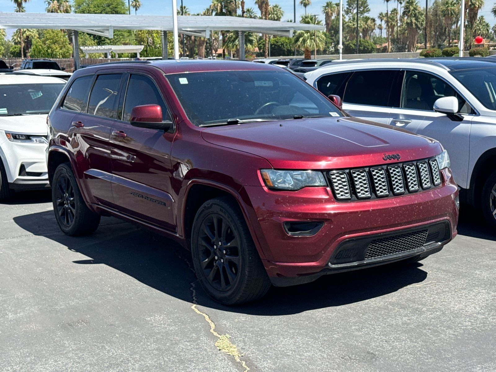 Used 2018 Jeep Grand Cherokee Altitude with VIN 1C4RJEAG0JC281195 for sale in Cathedral City, CA