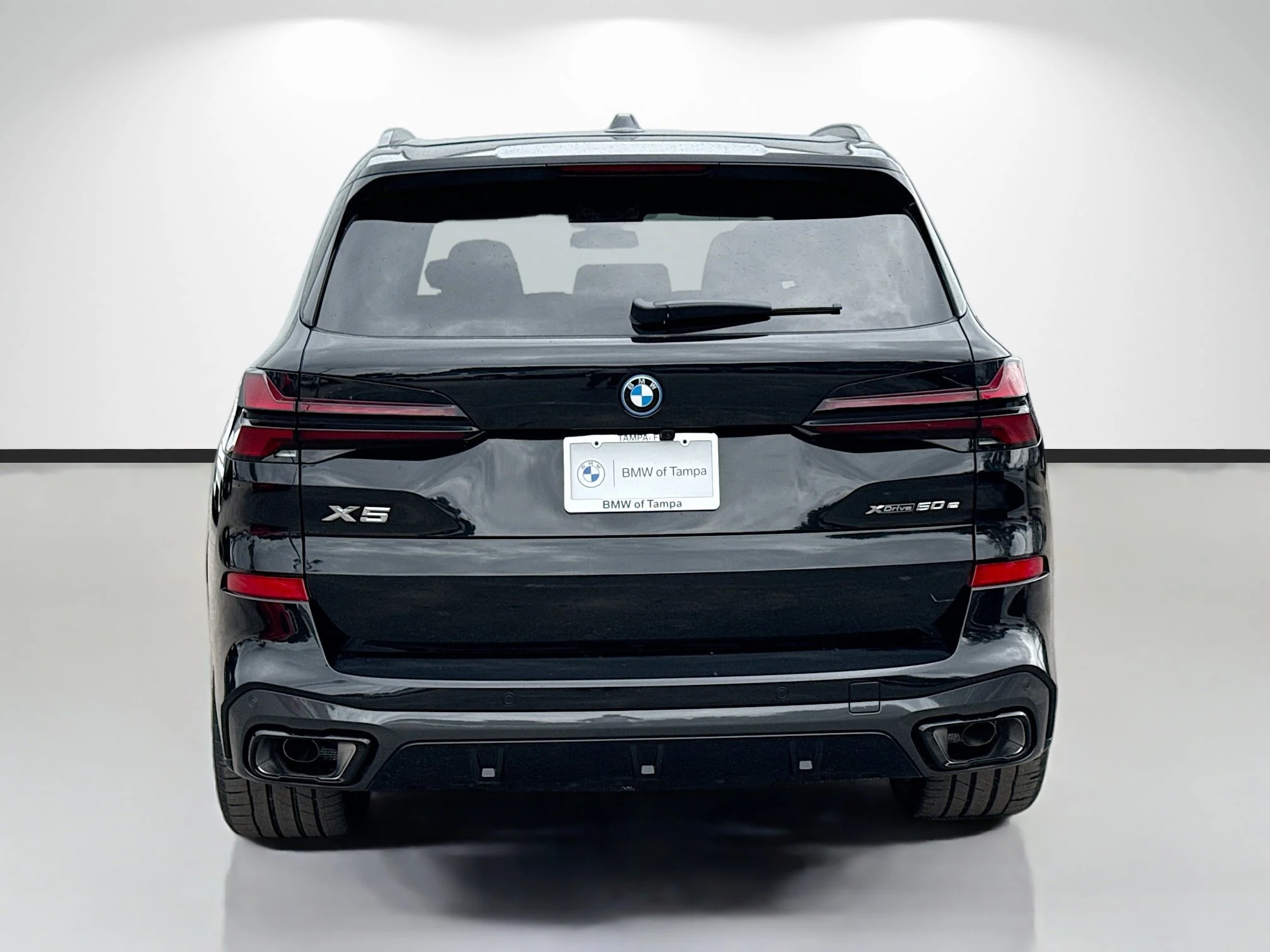 New 2026 Black Sapphire Metallic BMW xDrive50e image 4