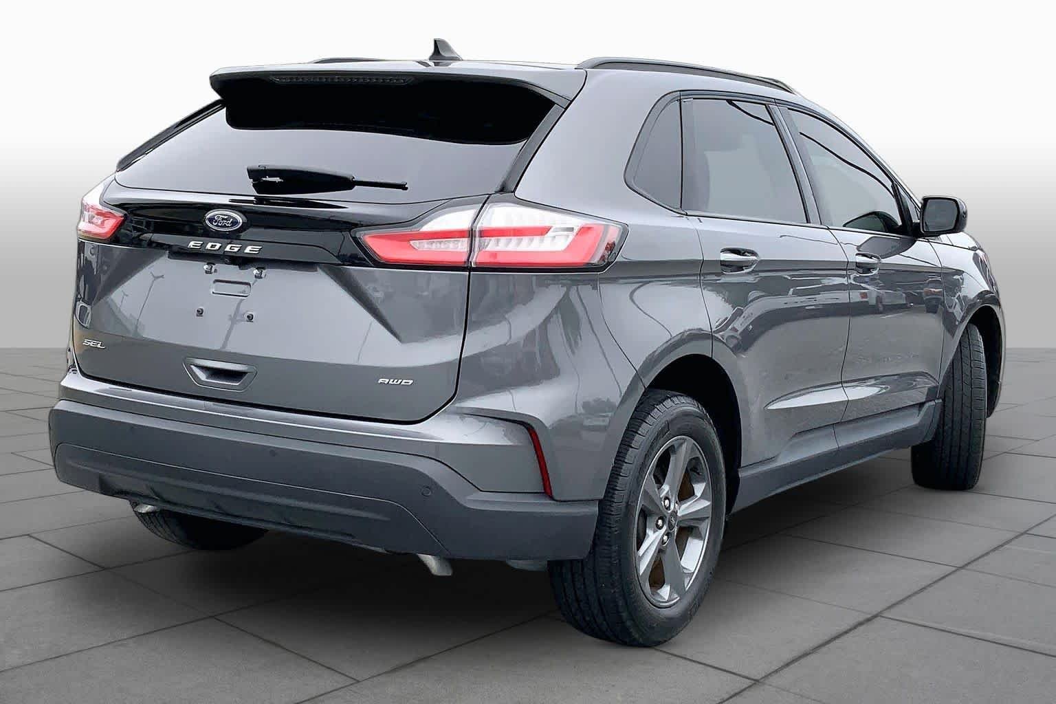 Used 2024 Carbonized Gray Metallic Ford SEL image 12
