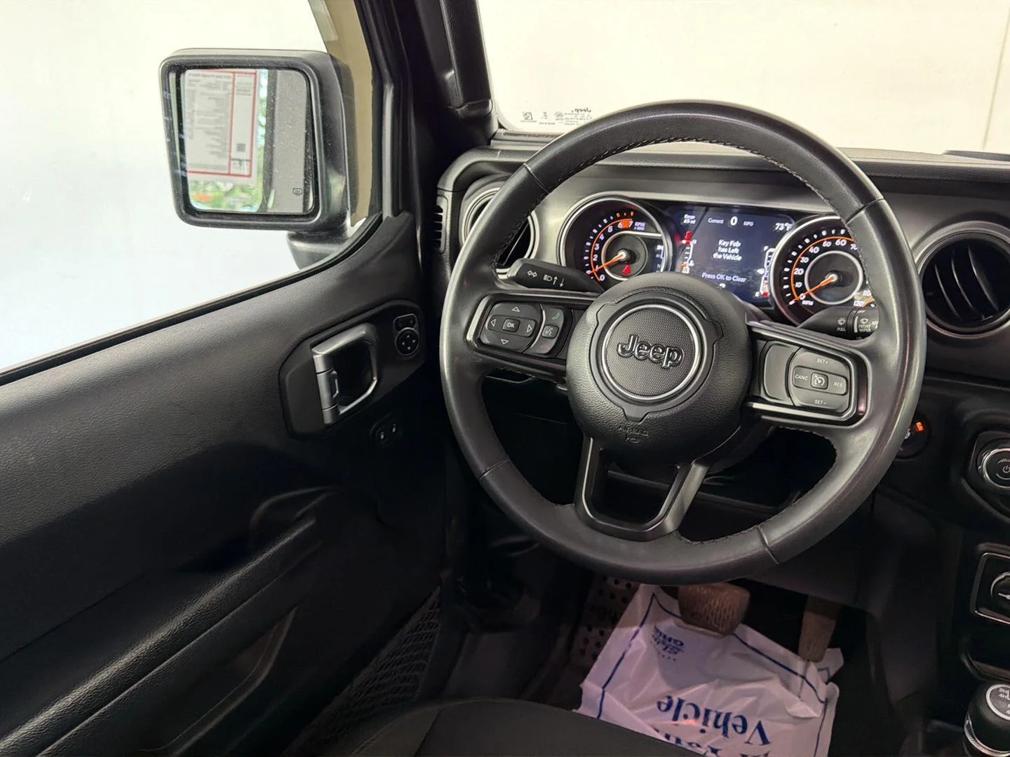 Used 2023 Granite Crystal Metallic Clearcoat Jeep Sport S image 18