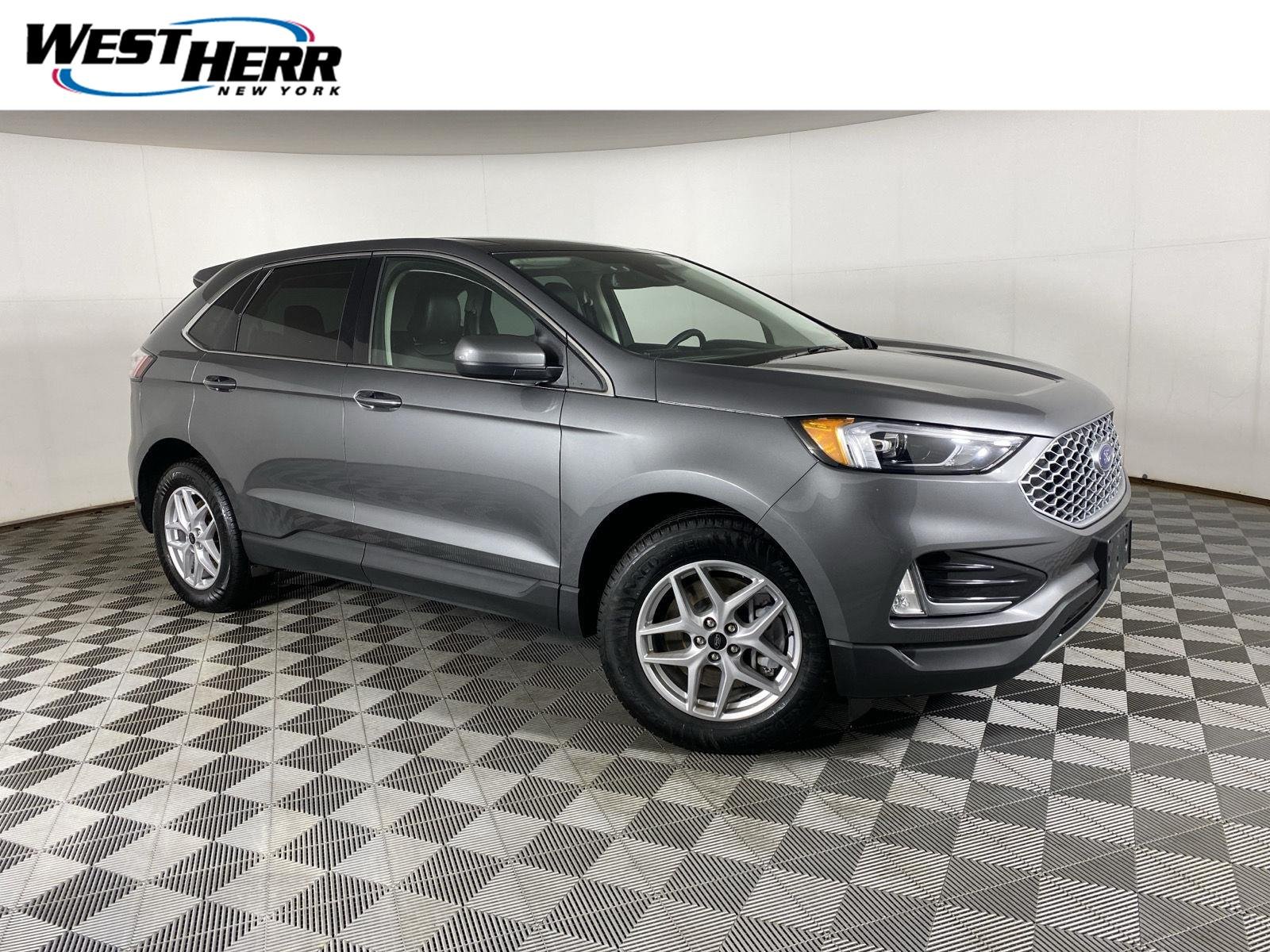 Used 2023 Carbonized Gray Ford SEL image 1