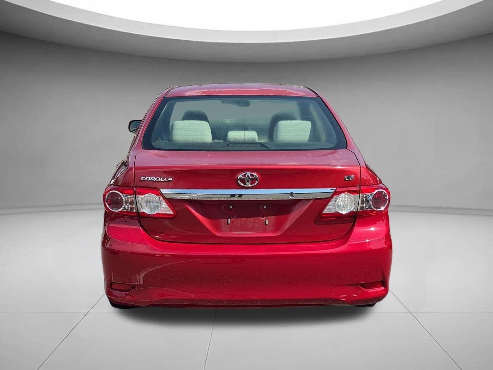 Used 2011 Barcelona Red Metallic Toyota LE image 4