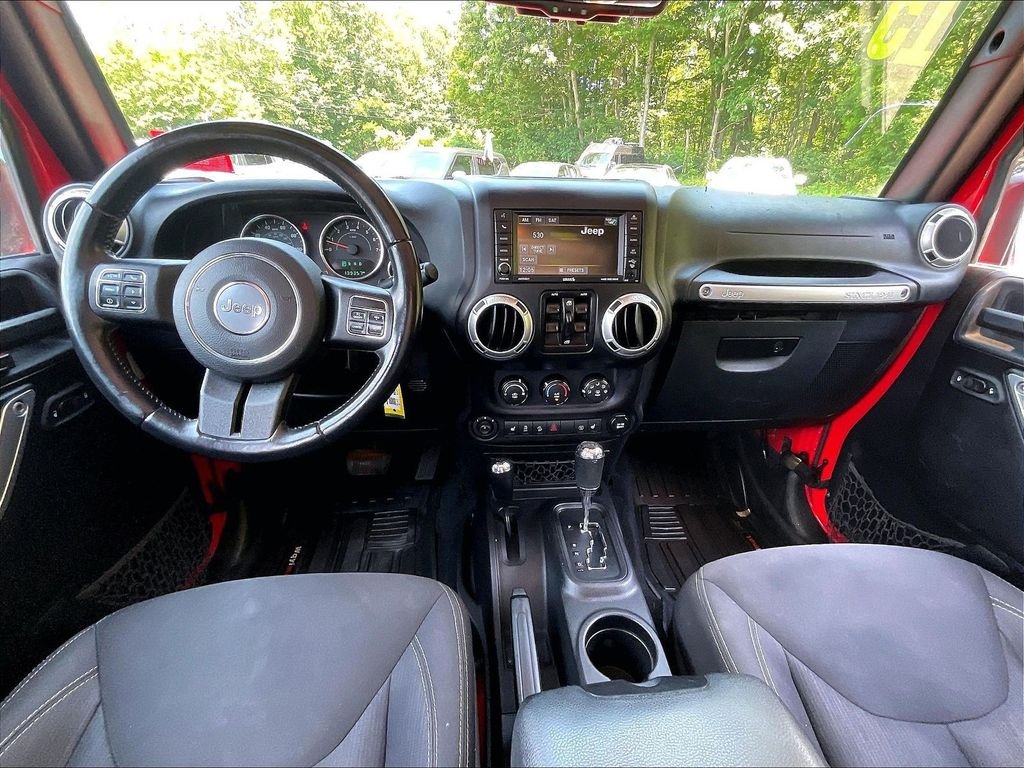 Used 2015 Red Jeep Unlimited Sahara image 20