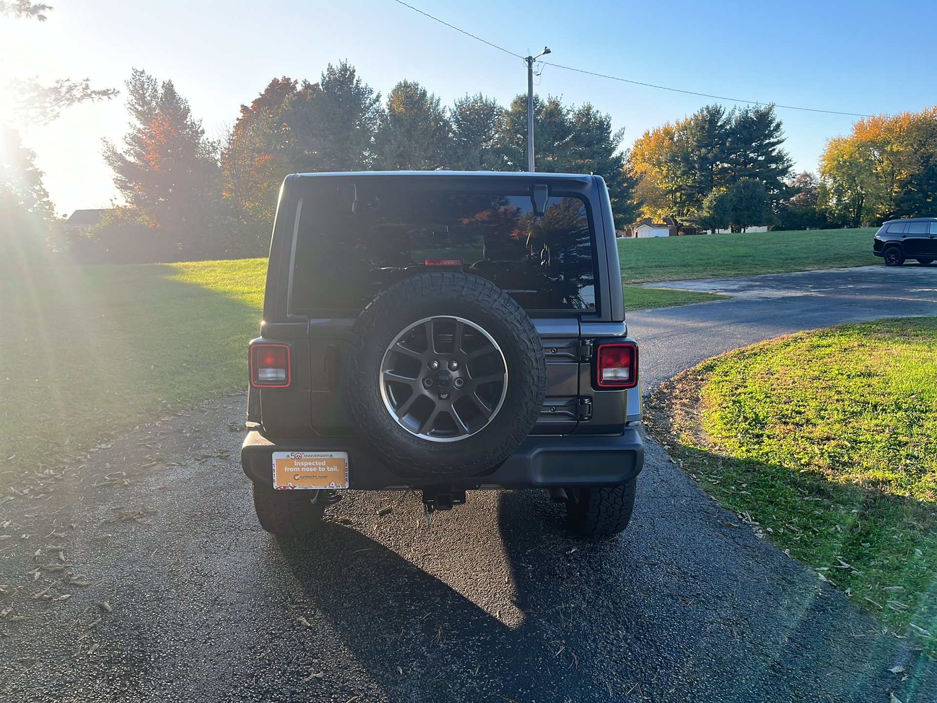 Used 2021 Granite Crystal Metallic Clear Coat Jeep Sport 80th Anniversary image 4