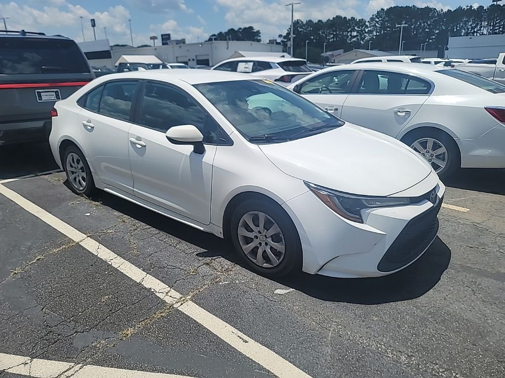 Used 2021 White Toyota LE image 1