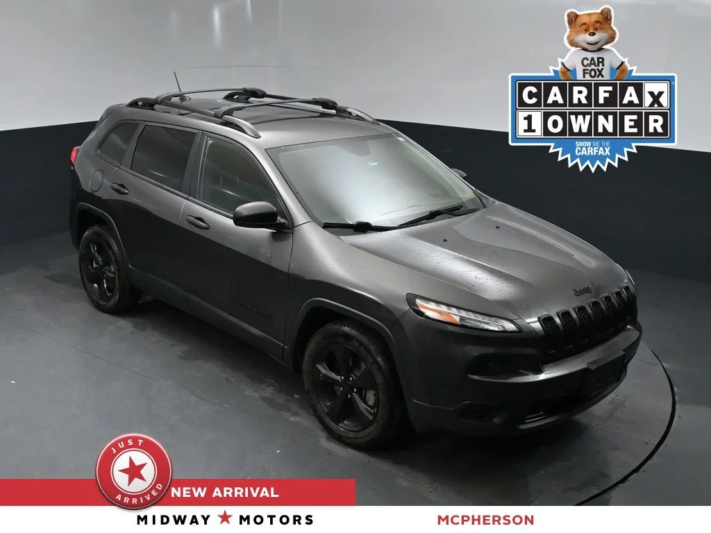 Used 2016 Gray Jeep Sport image 1