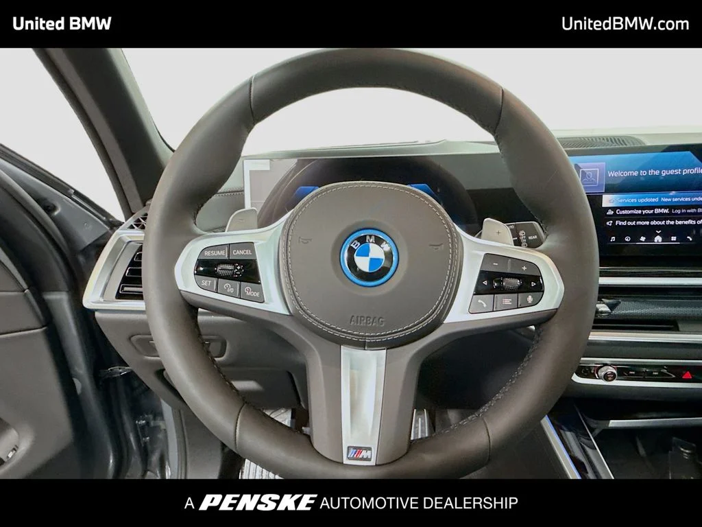 Used 2026 Skyscraper Grey Metallic BMW xDrive50e image 6