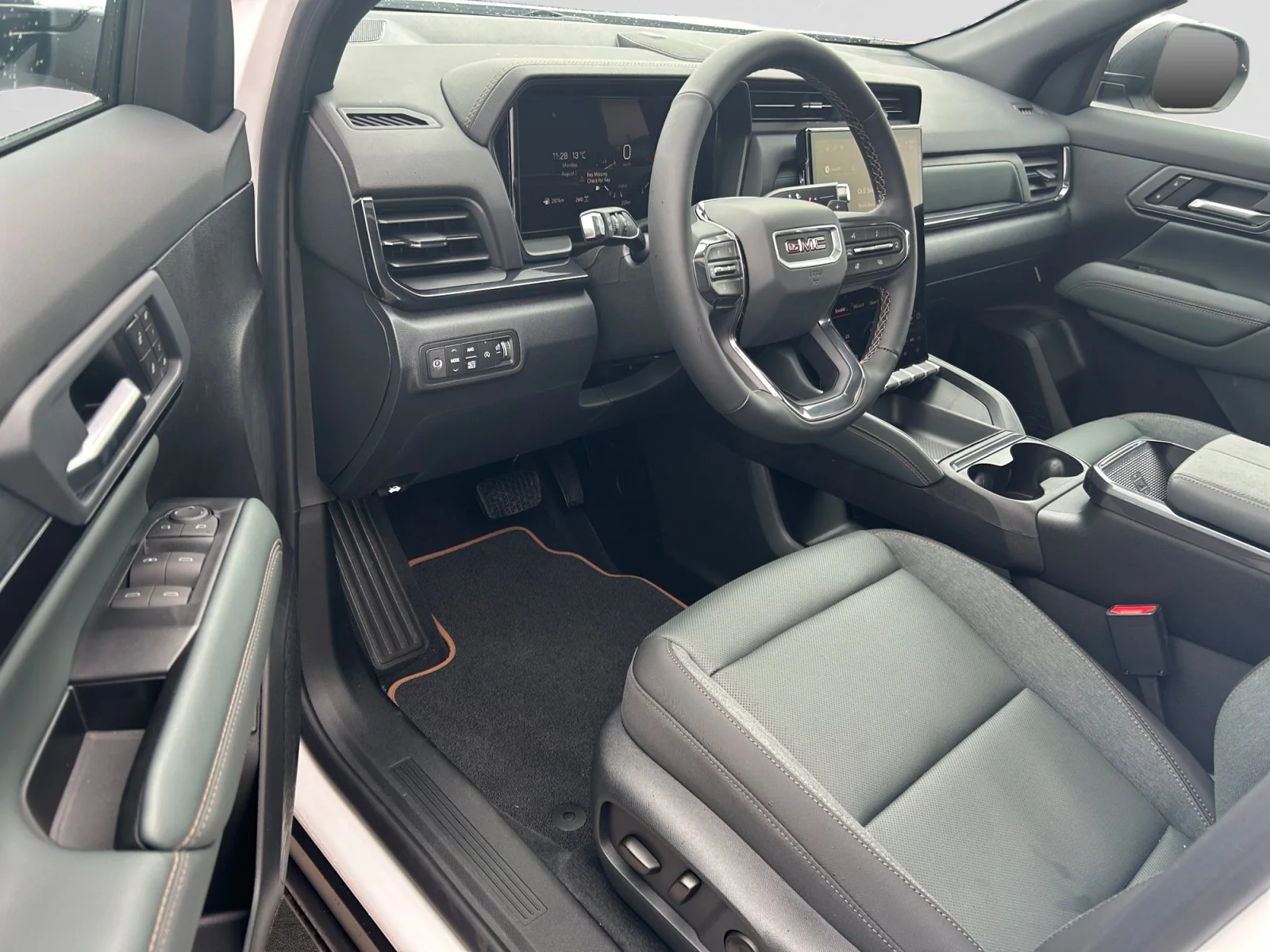 New 2027 Summit White GMC AWD AT4 image 13
