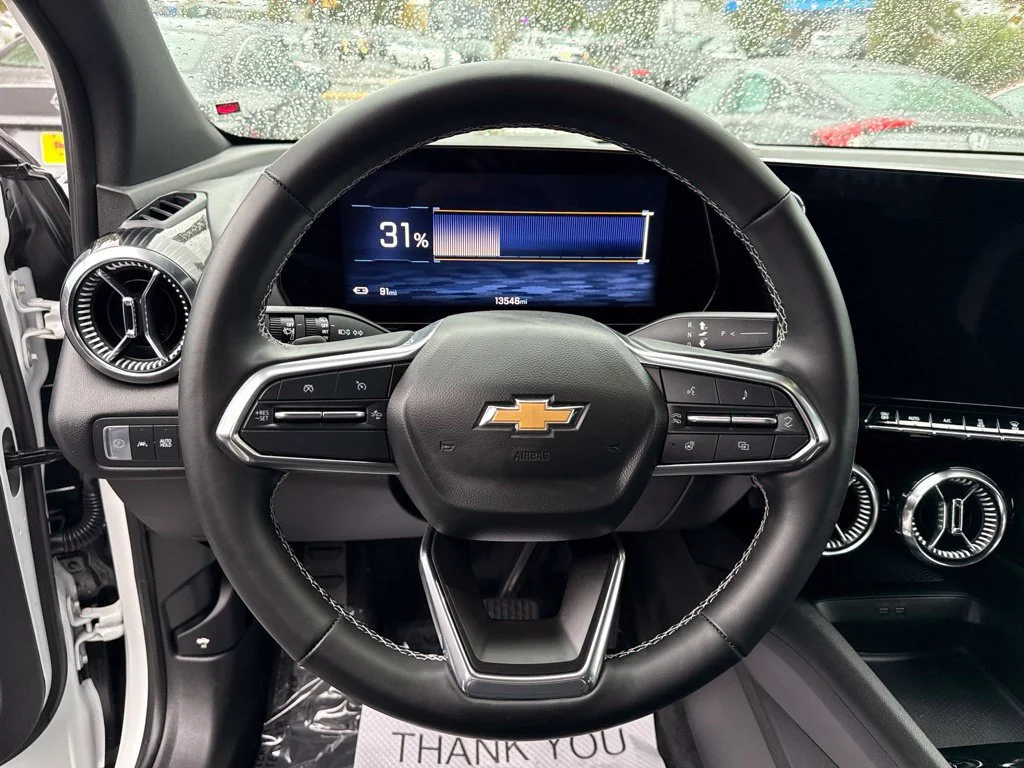 Used 2024 Summit White Chevrolet eAWD LT image 19