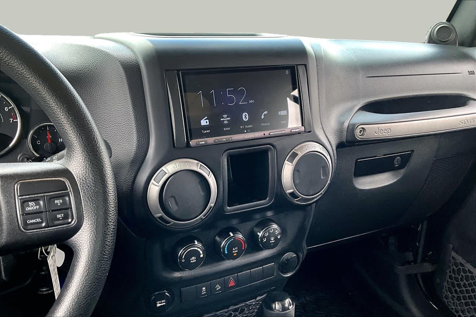 Used 2014 Black Clearcoat Jeep Sport image 7