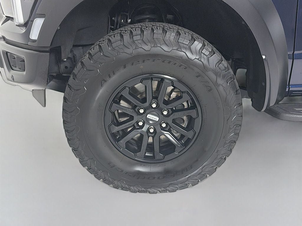 Used 2024 Antimatter Blue Metallic Ford Raptor 4WD SuperCrew 5.5
