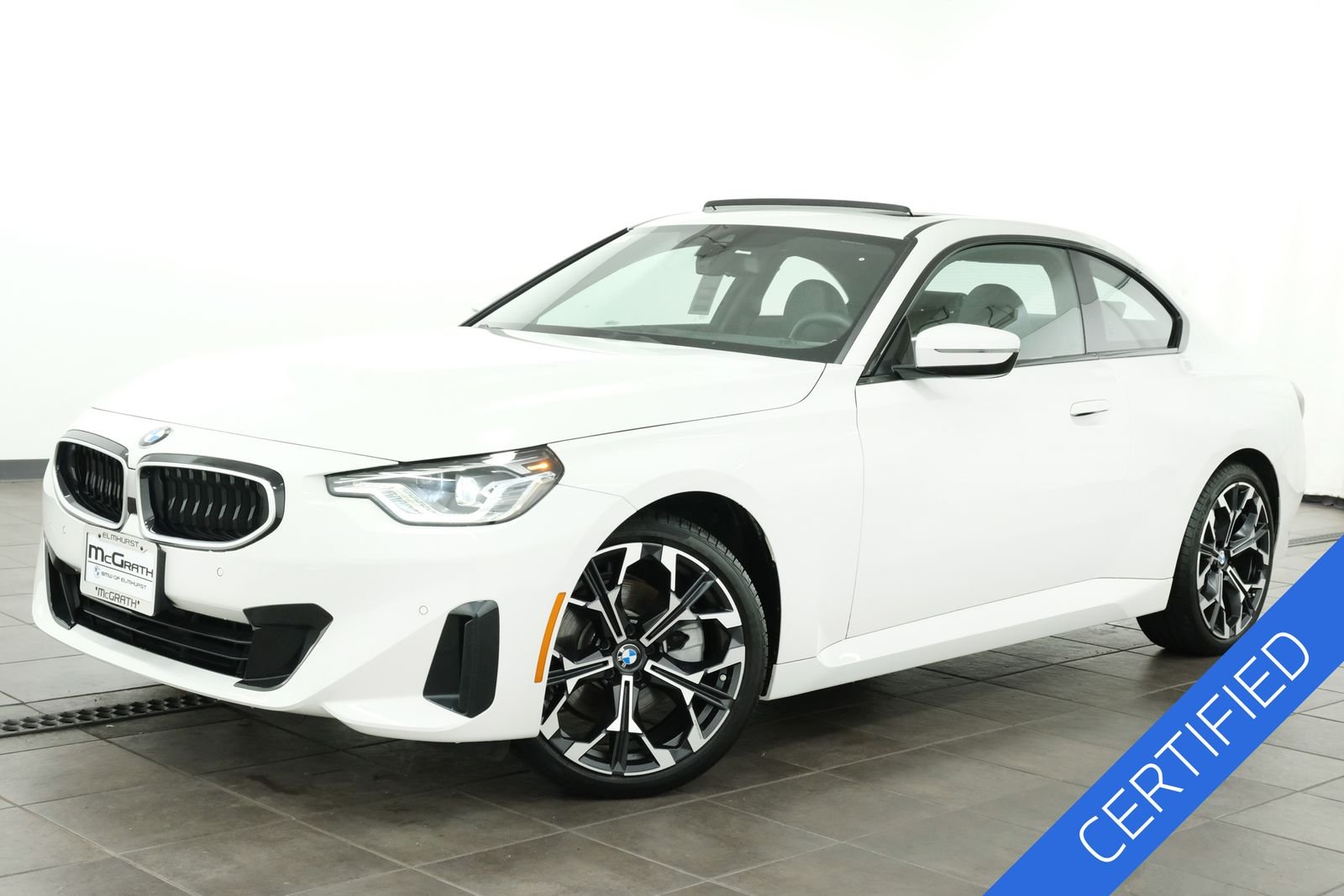 Certified Used 2025 Alpine White BMW 230i xDrive image 1