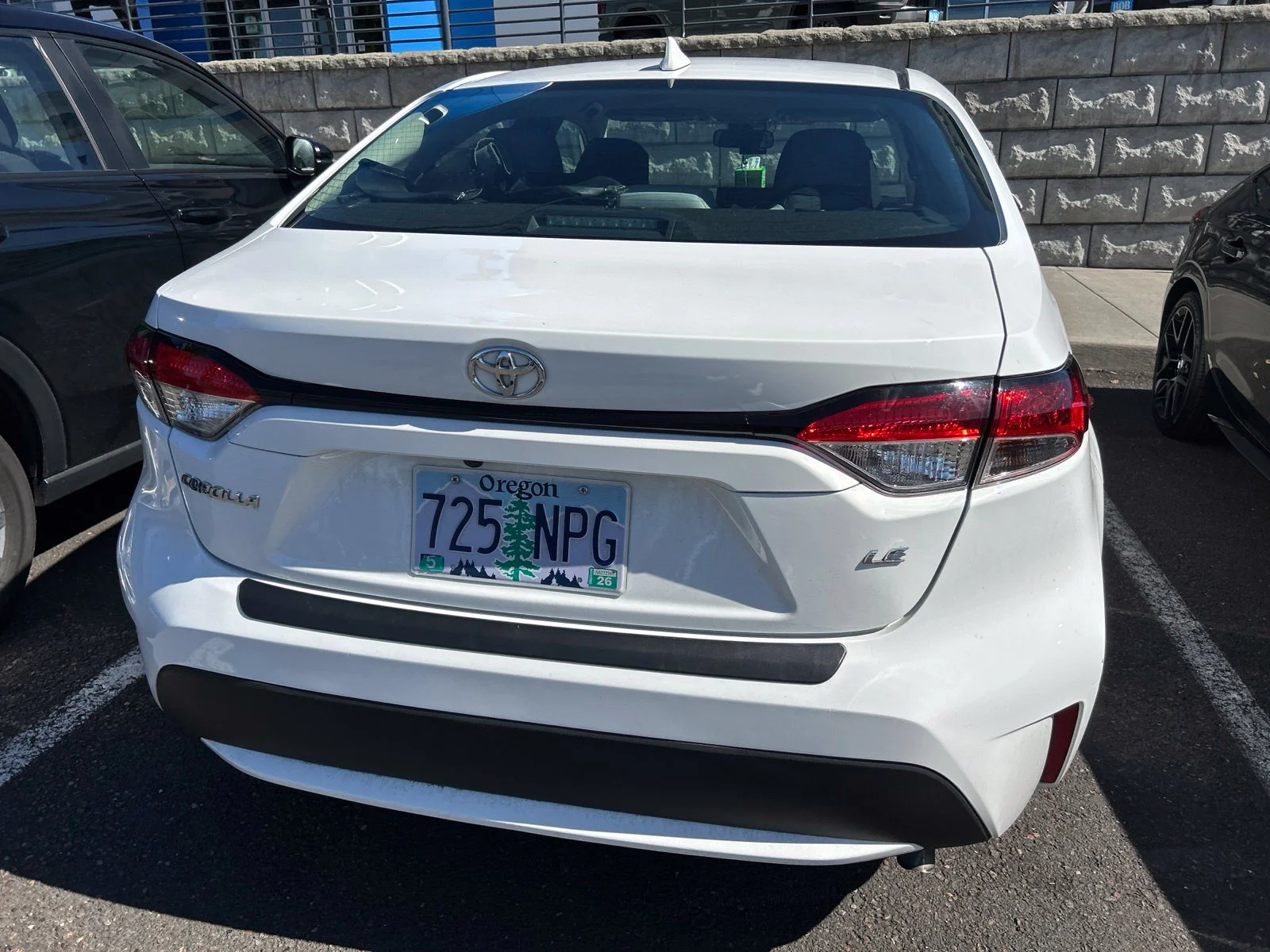 Used 2021 Super White Toyota LE image 6