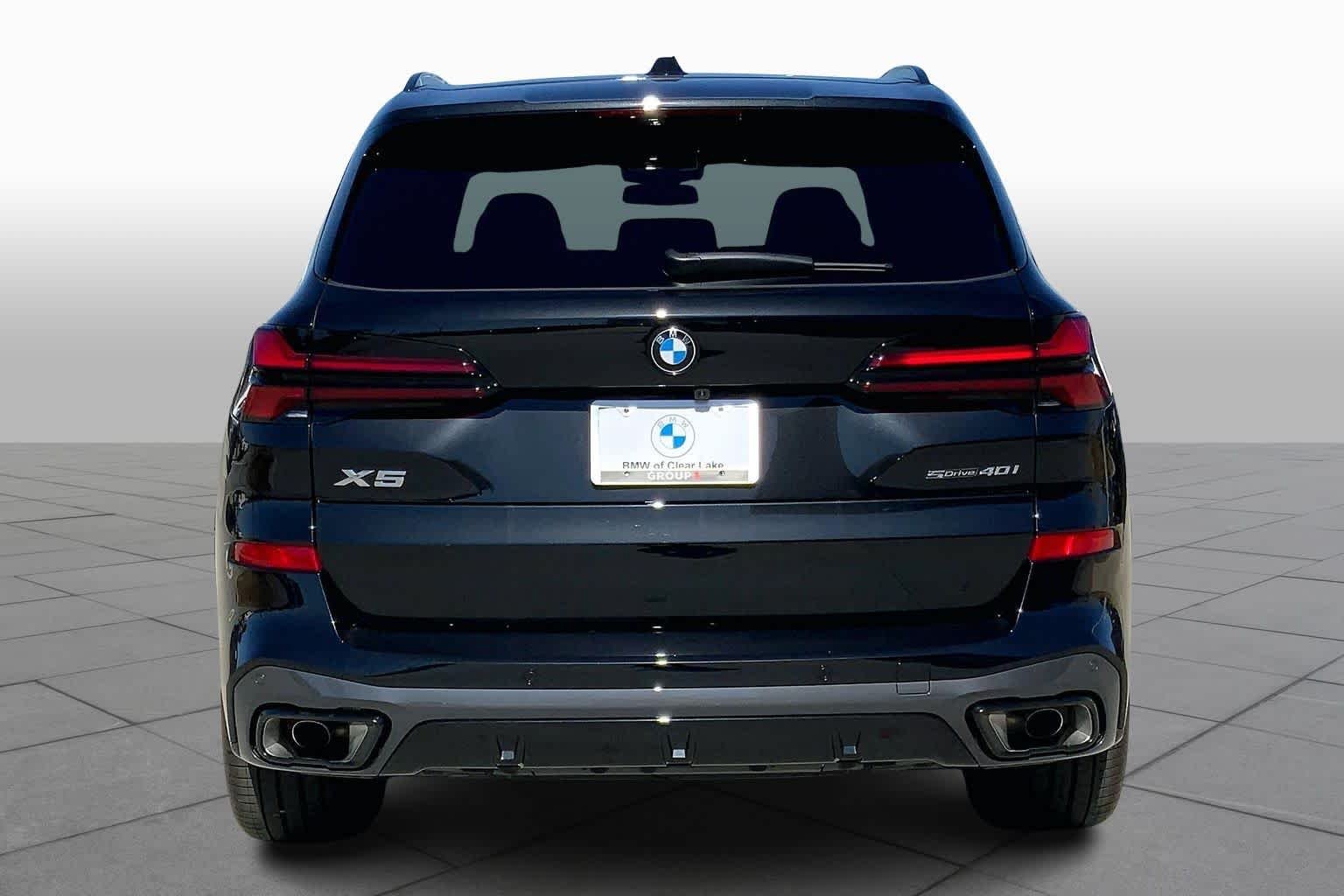 Used 2026 Black Sapphire Metallic BMW sDrive40i image 4