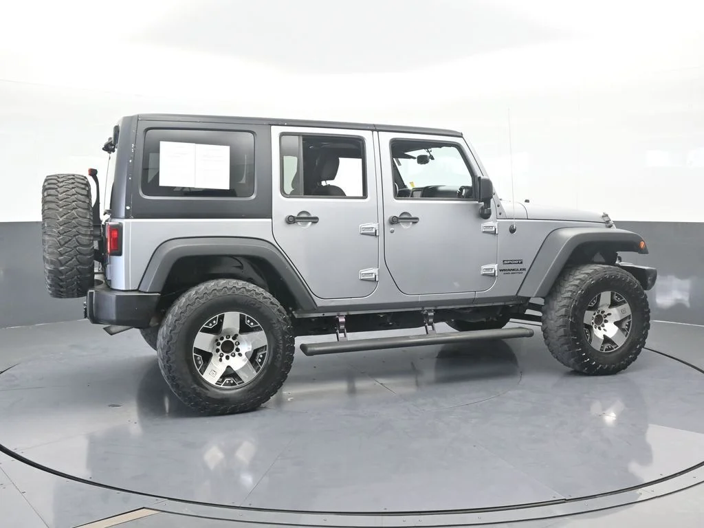 Used 2016 Billet Silver Metallic Clearcoat Jeep Unlimited Sport image 2