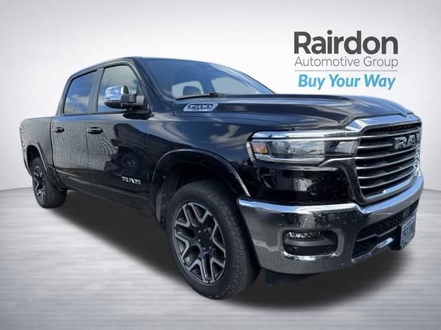 Used 2025 Diamond Black Crystal Pearlcoat Ram Laramie image 1