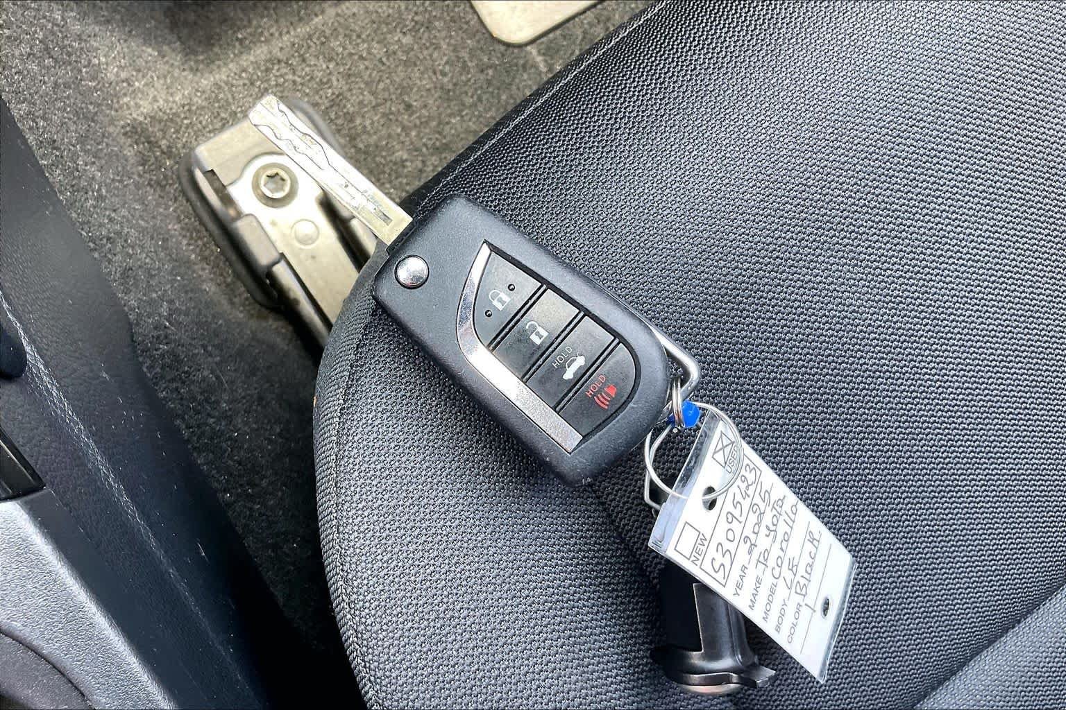 Used 2025 Midnight Black Metallic Toyota Hybrid LE image 13