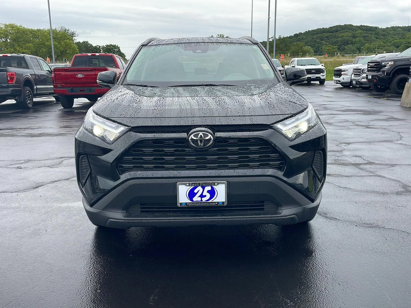 Used 2025 MIDNIGHT BLACK METALLIC TOYOTA TRUCK HYBRID XLE image 8