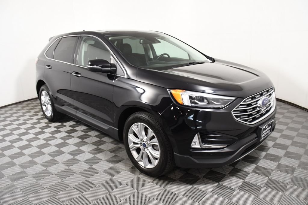 Used 2022 Agate Black Metallic Ford Titanium image 8