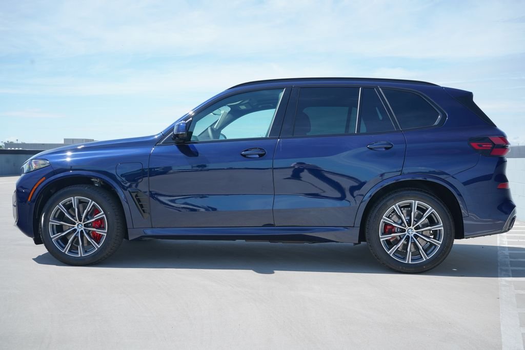 New 2026 Tanzanite Blue II Metallic BMW xDrive50e image 4