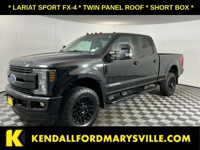 Used 2019 Agate Black Metallic Ford Lariat image 1
