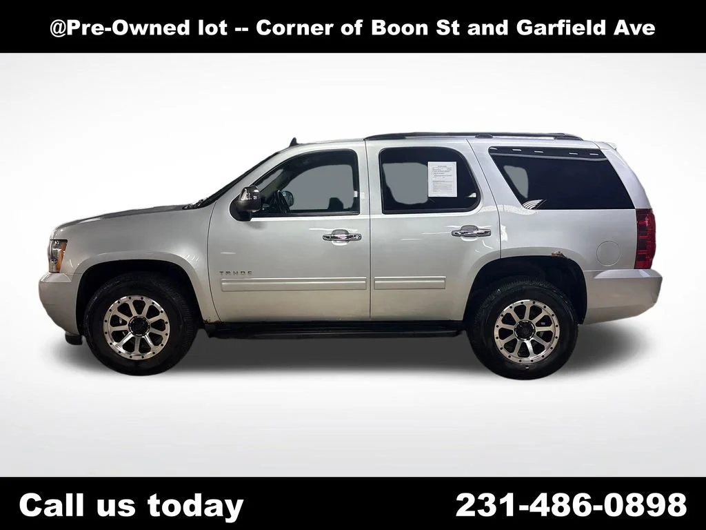 Used 2012 Chevrolet Tahoe LS with VIN 1GNSKAE04CR142201 for sale in Traverse City, MI