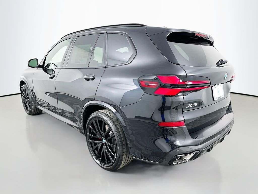 New 2026 Black Sapphire Metallic BMW sDrive40i image 7