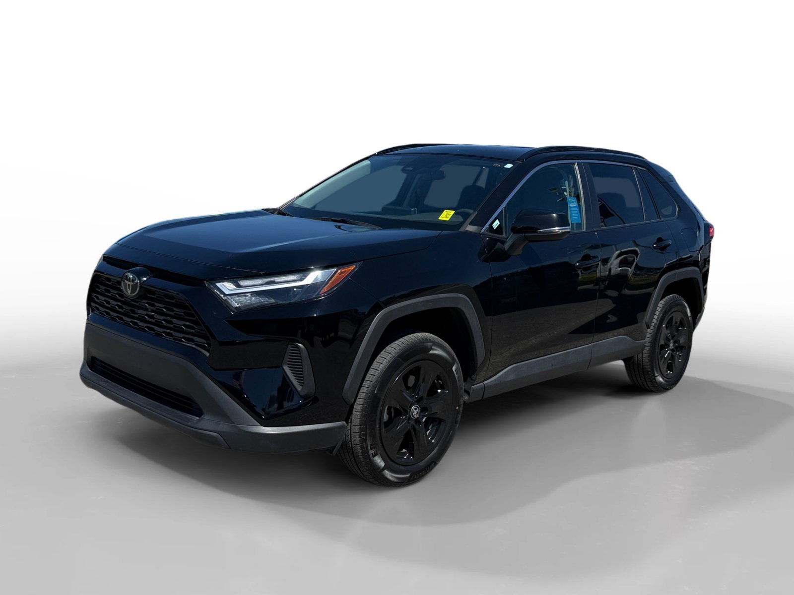 Used 2024 Midnight Black Metallic Toyota XLE image 1