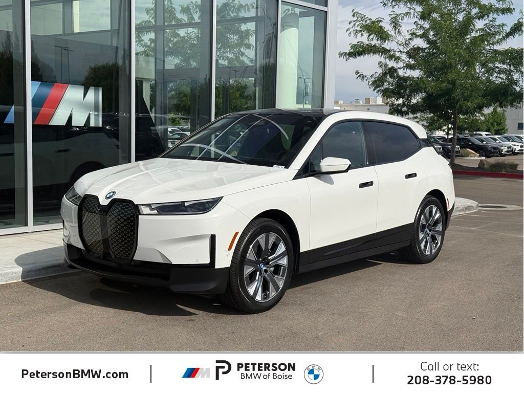 Used 2024 White BMW xDrive50 image 1