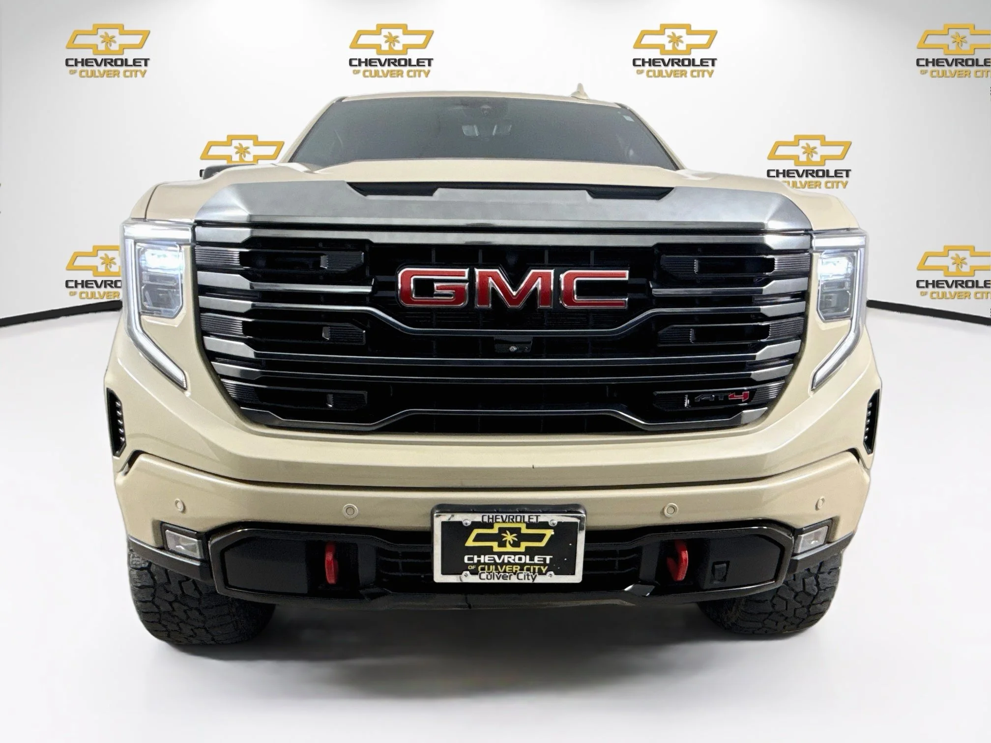 Used 2023 DESERT SAND METALLIC GMC AT4 image 2