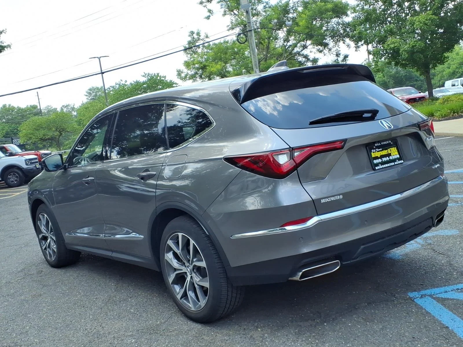 Used 2024 Liquid Carbon Metallic Acura SH-AWD TECH image 5