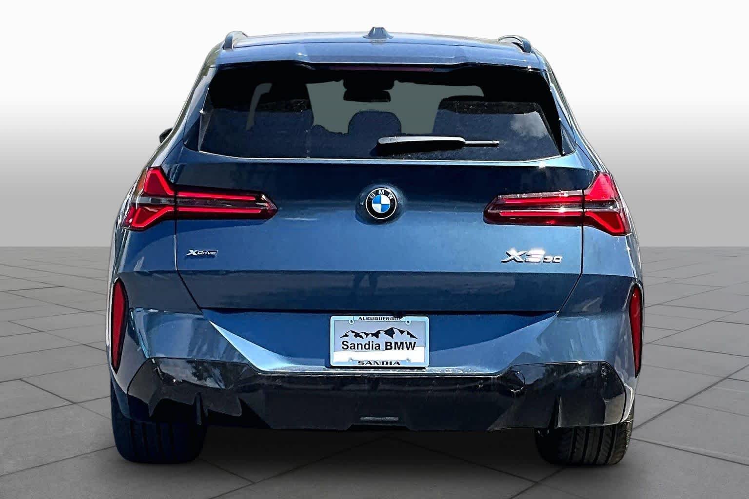New 2026 Arctic Race Blue metallic BMW 30 xDrive image 4
