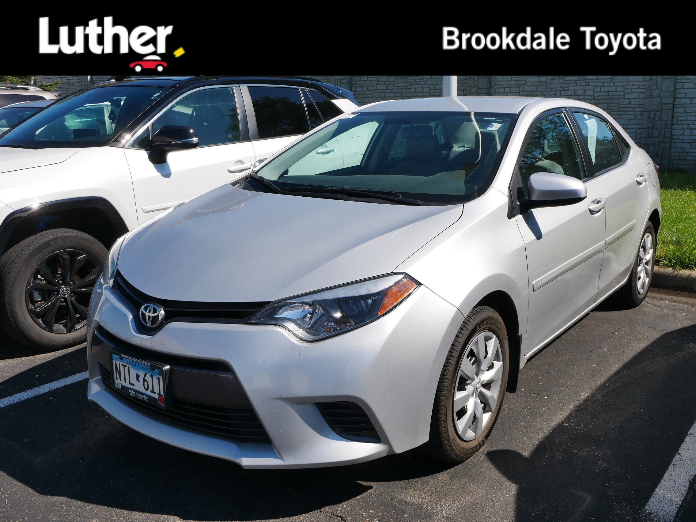 Used 2015 Classic Silver Metallic Toyota LE image 1