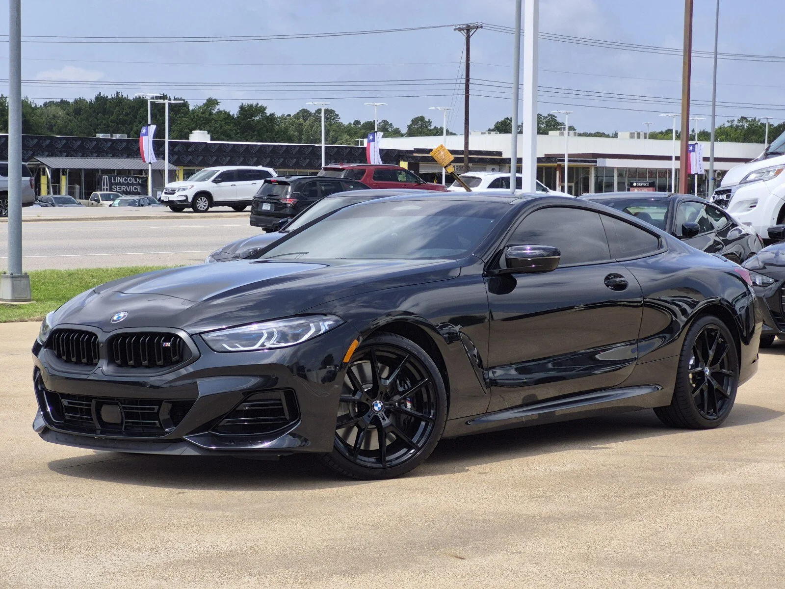 Used 2026 Black Sapphire Metallic BMW M850i xDrive image 1