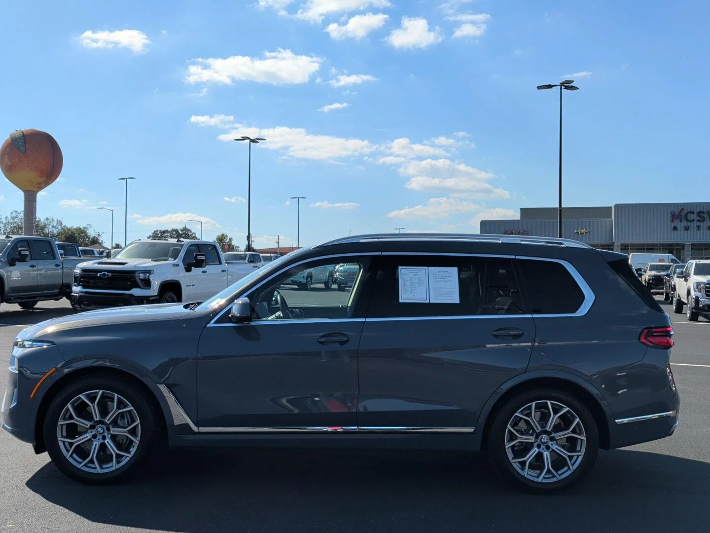 Used 2025 Sparkling Copper Metallic BMW xDrive40i image 2